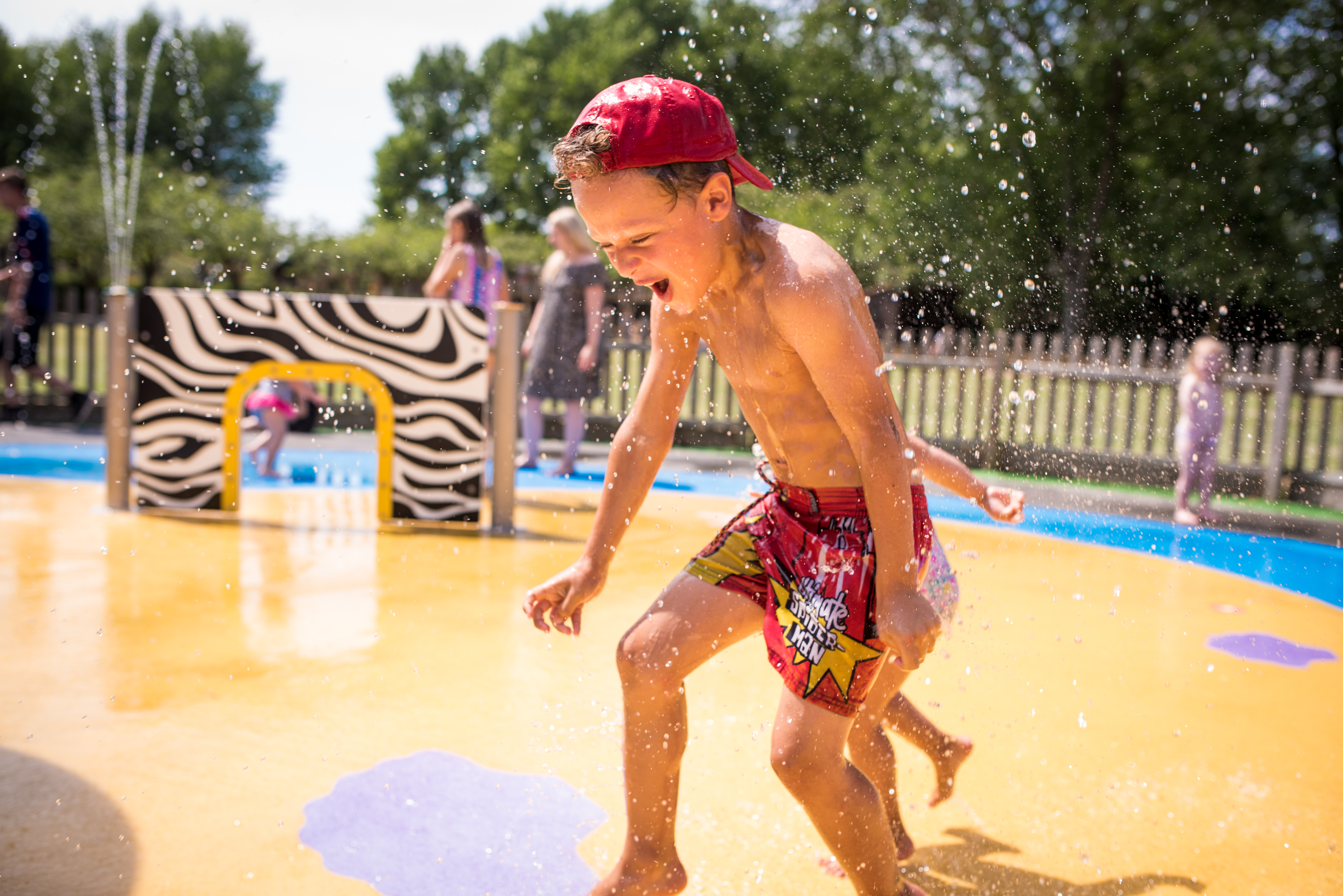 Boy runs through Wet 'n' Wild - July 2018