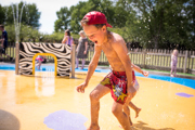 Boy runs through Wet 'n' Wild - July 2018